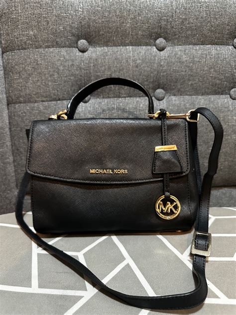 michael korrs small used leather handbags